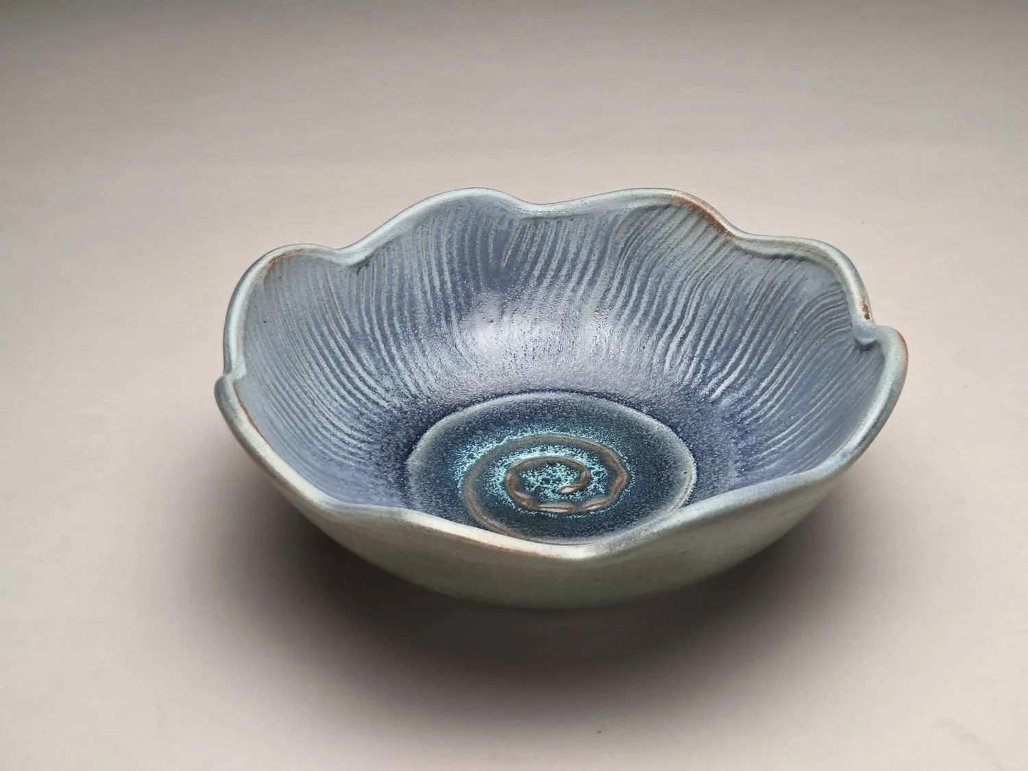 Whirlpool & Blue Sky Bowl (#26.5.6a), 2026, glazed stoneware, 2.75 x 7.75 x 7.75 inches (7 x 19.5 x 19.75 cm), $100 Cdn.