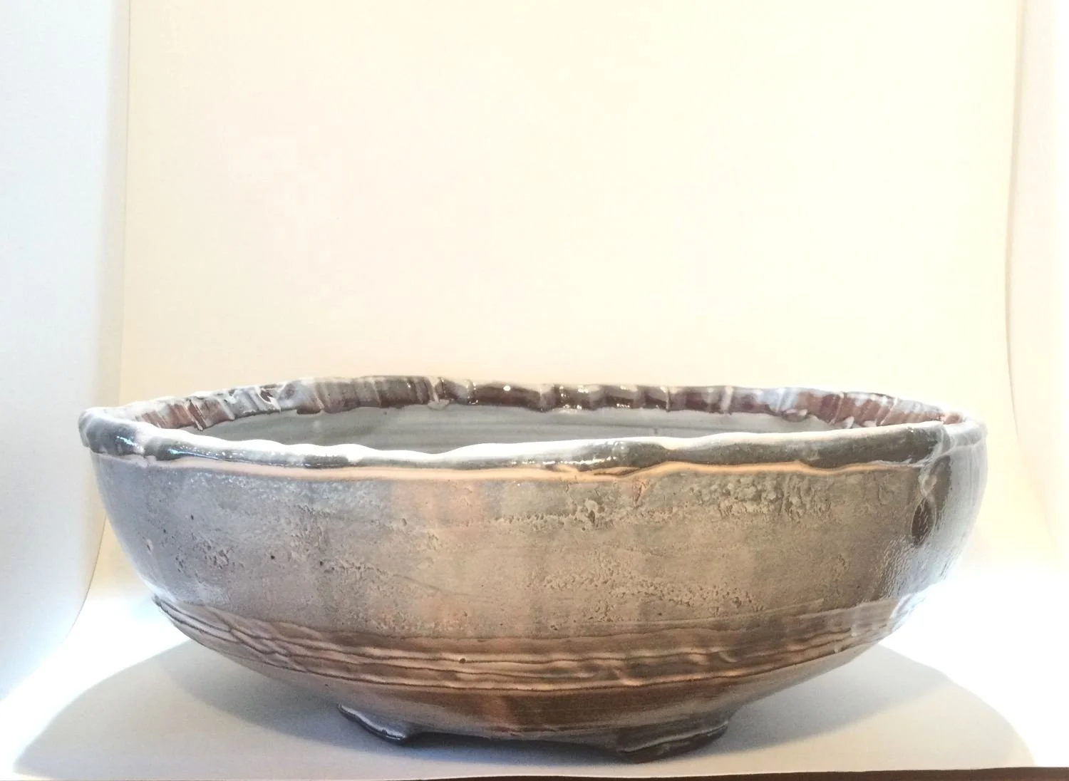 Large Confluence Bowl (#26.2.43), 2026, low soda-fired earthenware, 4 x 11 x 11.5 inches (10 x 28 x 28.5), $270 Cdn.