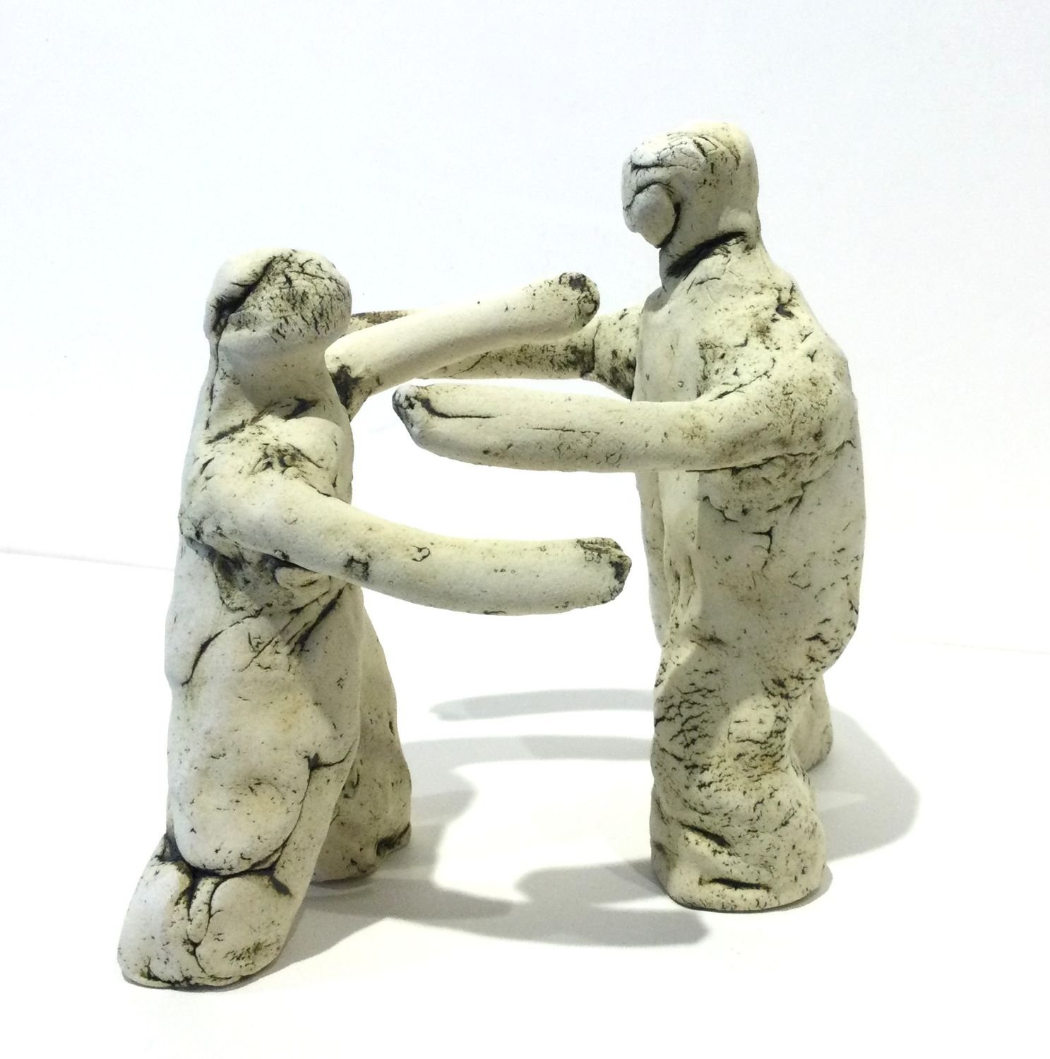 The Dreamers #32.7 and #32.8, 2025, stoneware, 7.5 x 3 x 2 inches (19 x 8 x 5 cm) each, $325 Cdn each.