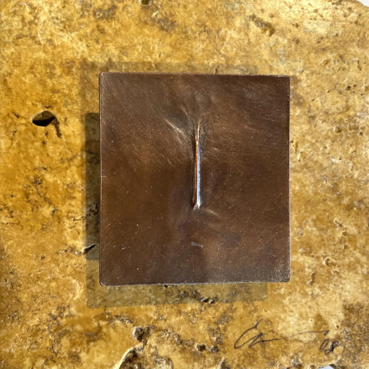 ‘Mote’ Wallpiece, 2008, materials Copper and stone, 4 x 4 x 1 inches (10.16x10.16x2.54cm), $400 Cdn.