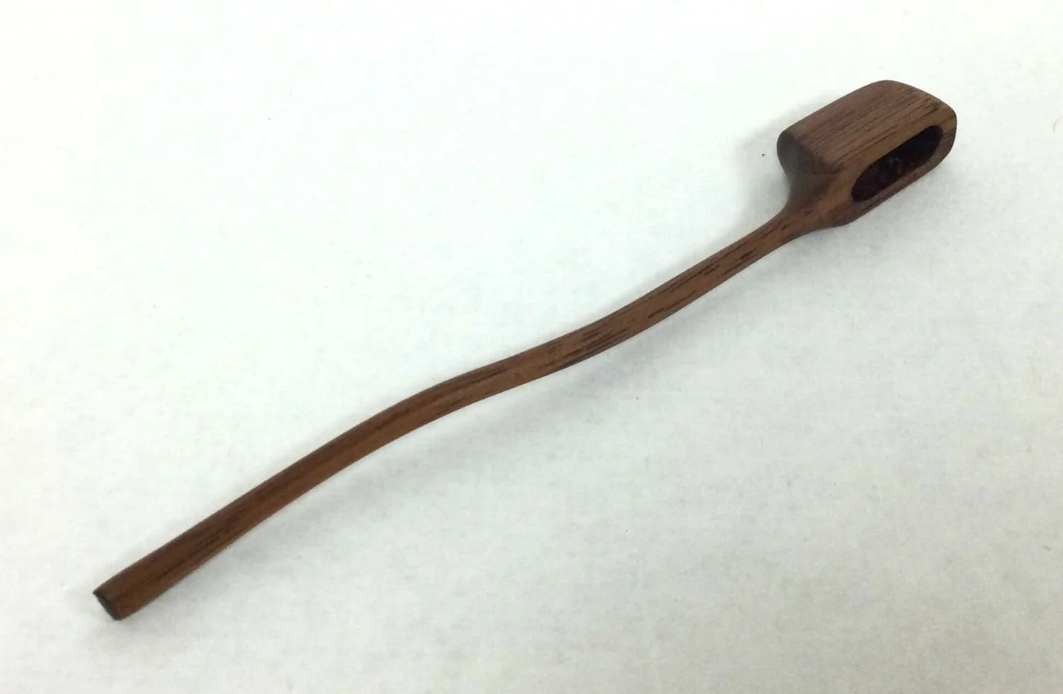 Deep Dish Small Spoon (#25.12.11), 2025, hand carved & sanded walnut, 4.5 x .5 x .25 inches (11.5 x 1.5 x 1 cm), $24.95 Cdn.