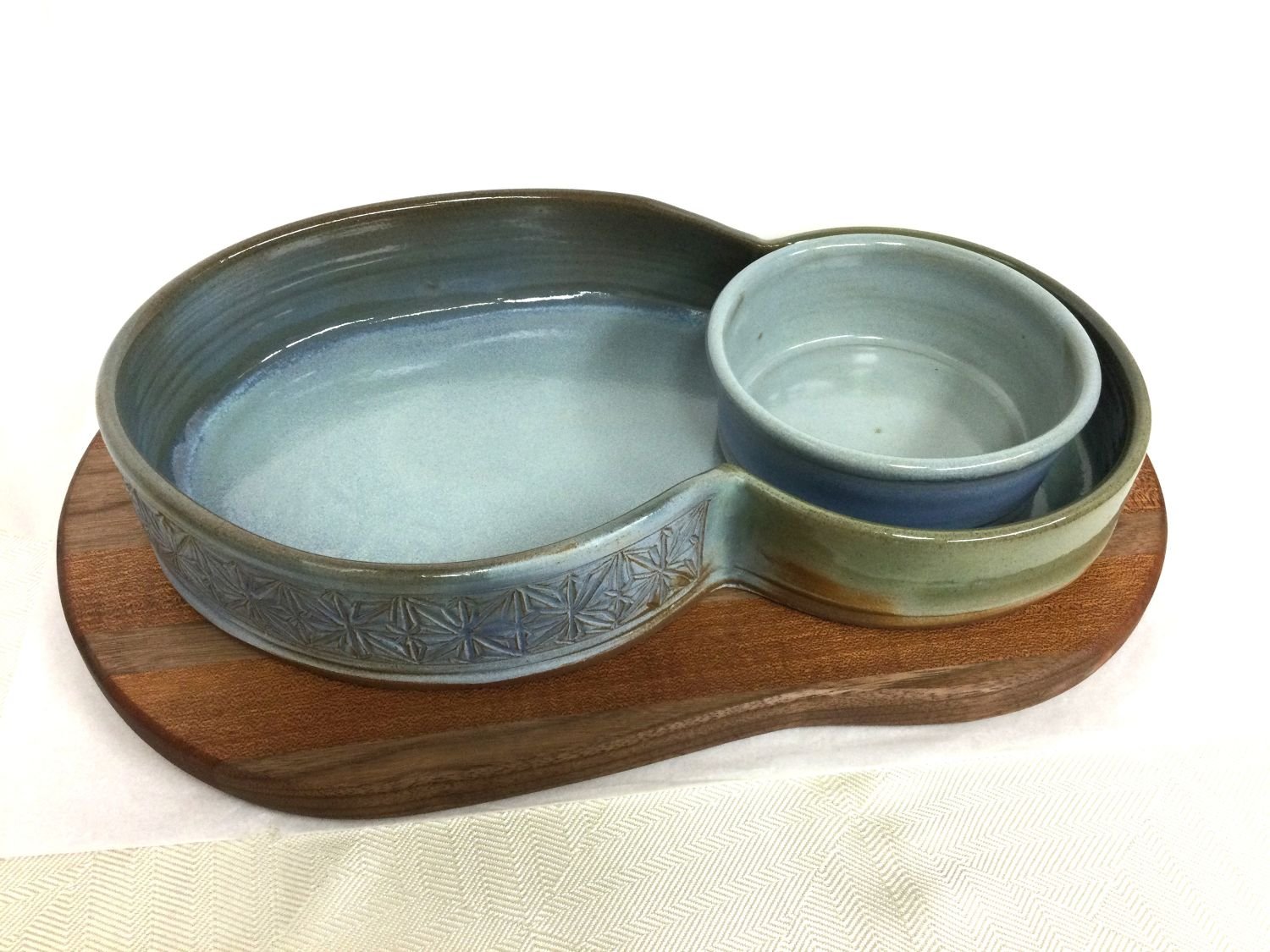 Mountain Pools Chambered Bowls with Handmade Striped Wood Charcuterie Board (#24.12.1), 2024, stoneware & wood, 3.75 x 10.5 x 17" ( 9.5 x 24.5 x 43 cm), $375 Cdn.