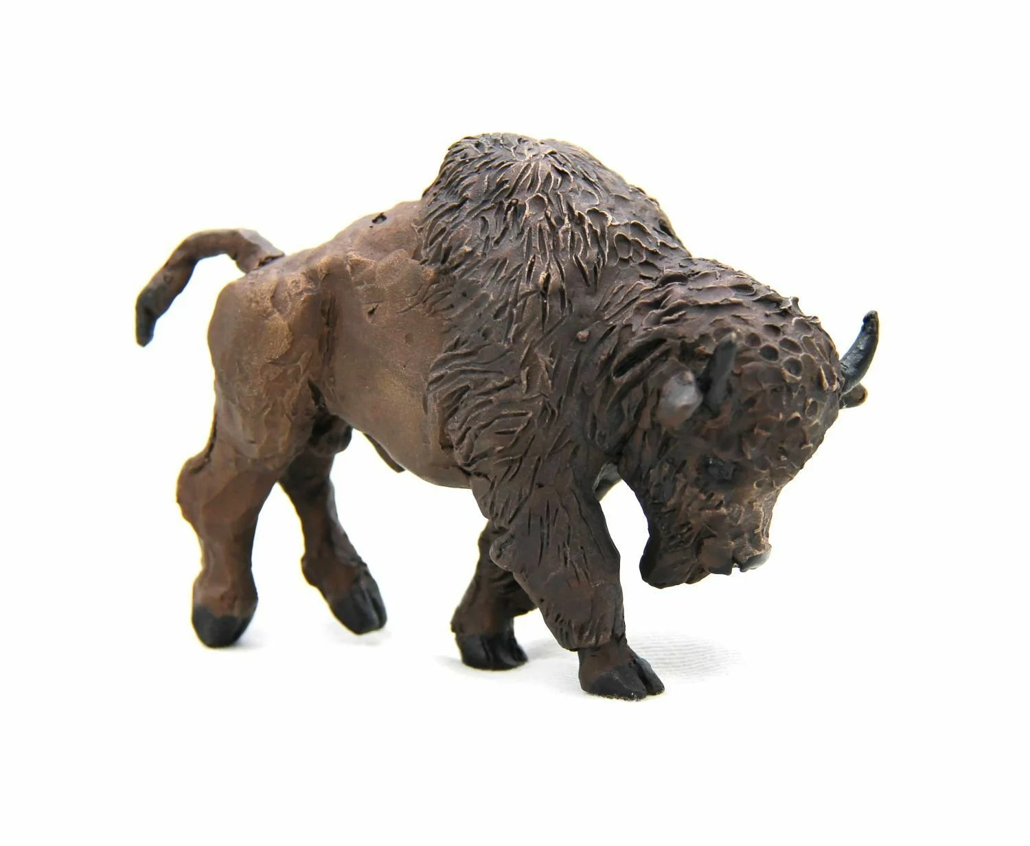 Free To Roam (Bison Calf) (#25.12.6), 2025, unique patinated bronze, 3.5 x 4.5 x 2 inches ( 9 x 12 x 5 cm) sold.