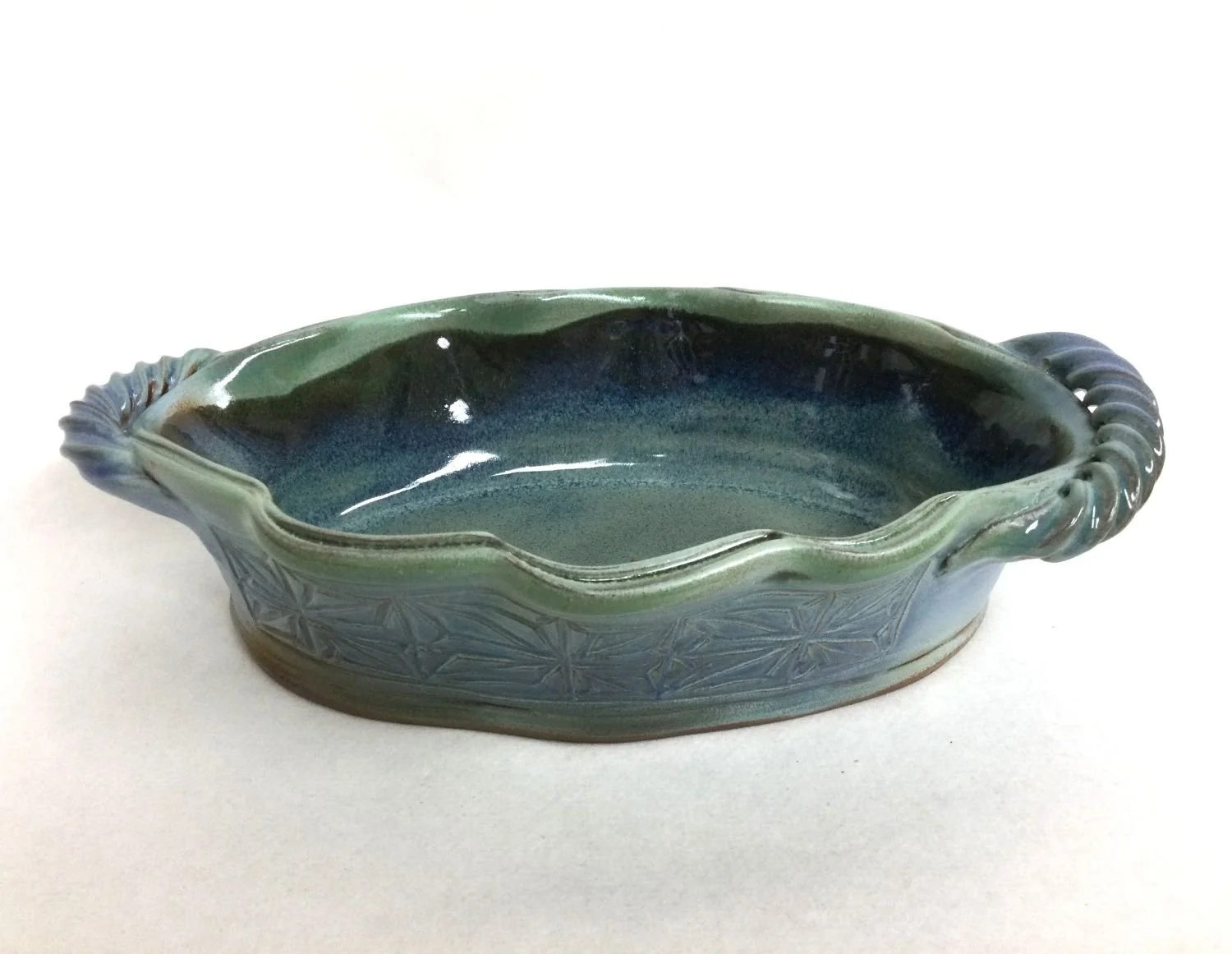 Kumiko Blue Sky Wavy Lipped Serving Bowl (#25.9.2), 2025, stoneware, 2.75 x 7 x 11" (7 x 18 x 28 cm), $150 Cdn.