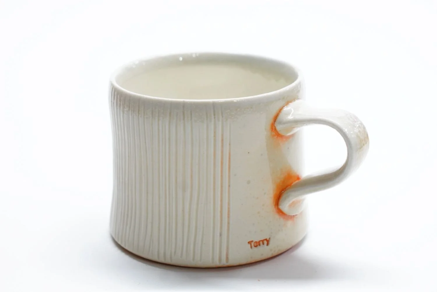 Espresso Cup (#25.74), 2025, soda fired porcelain, 2.25 x 3 x 4" (5.5 x 7.5 x 10 cm) $40 Cdn.
