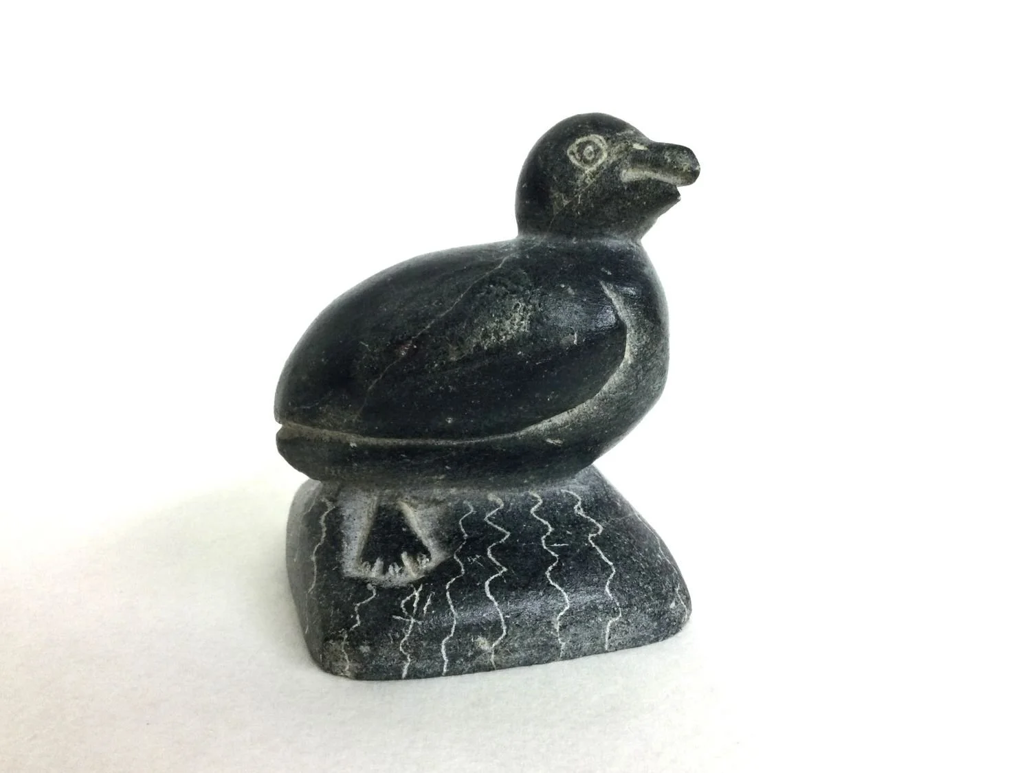 Josie Pappy (Jusi Pamiuttu Papialuk) E9-861 (1918-96) Povungnituk/Puvirnituq (Inuktitut: ᐳᕕᕐᓂᑐᖅ), Sea Bird, n.d., steatite (soapstone), 3x2.25x3 inches (7.5 x 6 x 7.5 cm), provenance: private collection BC, $350 Cdn.