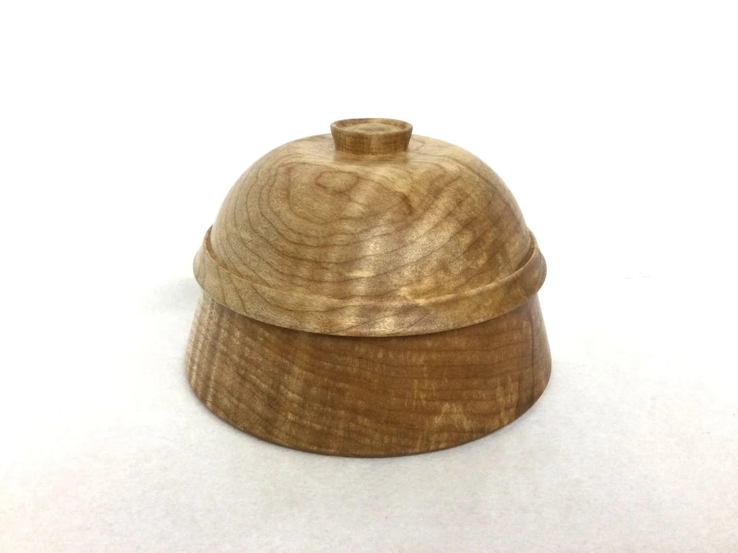 Lidded Figured Maple Box BX18, 2024, turned maple, 3 x 4.5 inches (7.5 x 11.5 cm), sold.