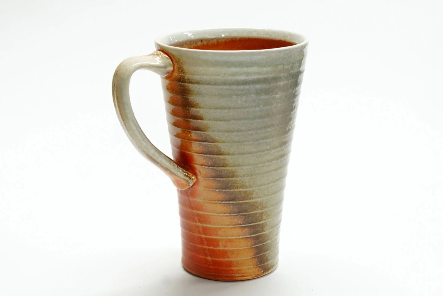 Tall BeeHive Mug (#25.54), soda fired porcelain, 6 x 5 x 3.75 inches (15.5 x 13 x 9.5cm), sold.