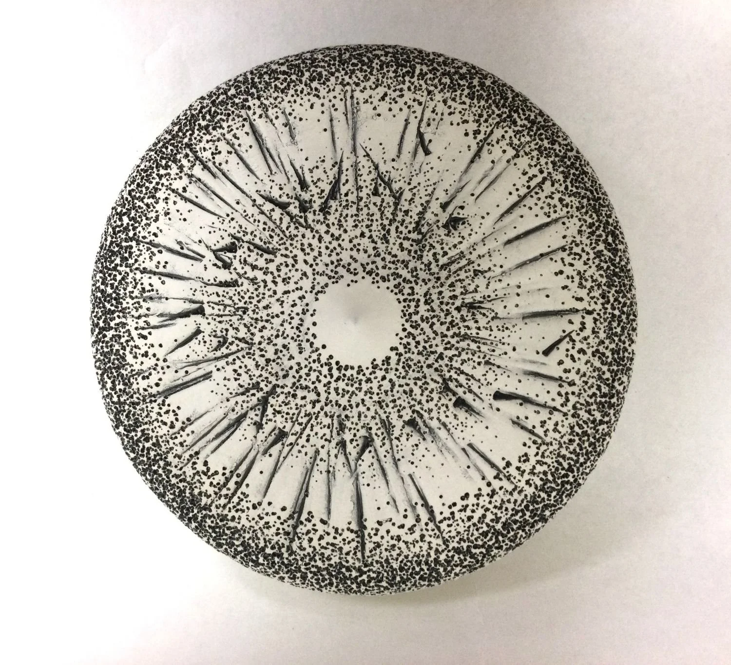 Heartbeat Series 1 (#25.9.1), 2023, earthenware clay, black glaze wall hanging, 10.5 x 3" ( 26.5 x 7.5 cm), $425 Cdn.