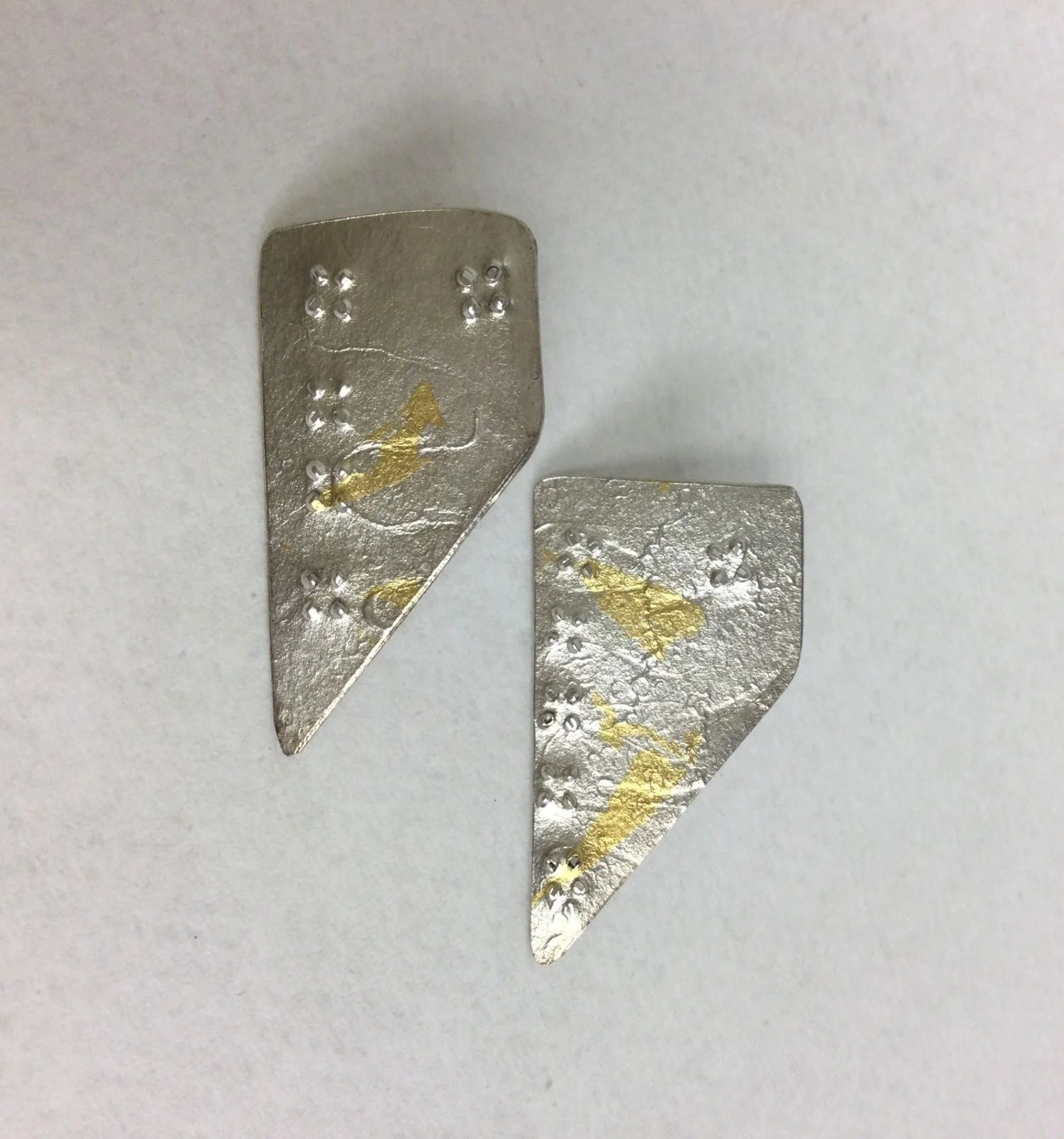 Desert Post Earrings (#191b), 1989, sterling silver, 24k gold, 1 x 1.25 inches (2.5 x 3.8 cm), $120 Cdn.