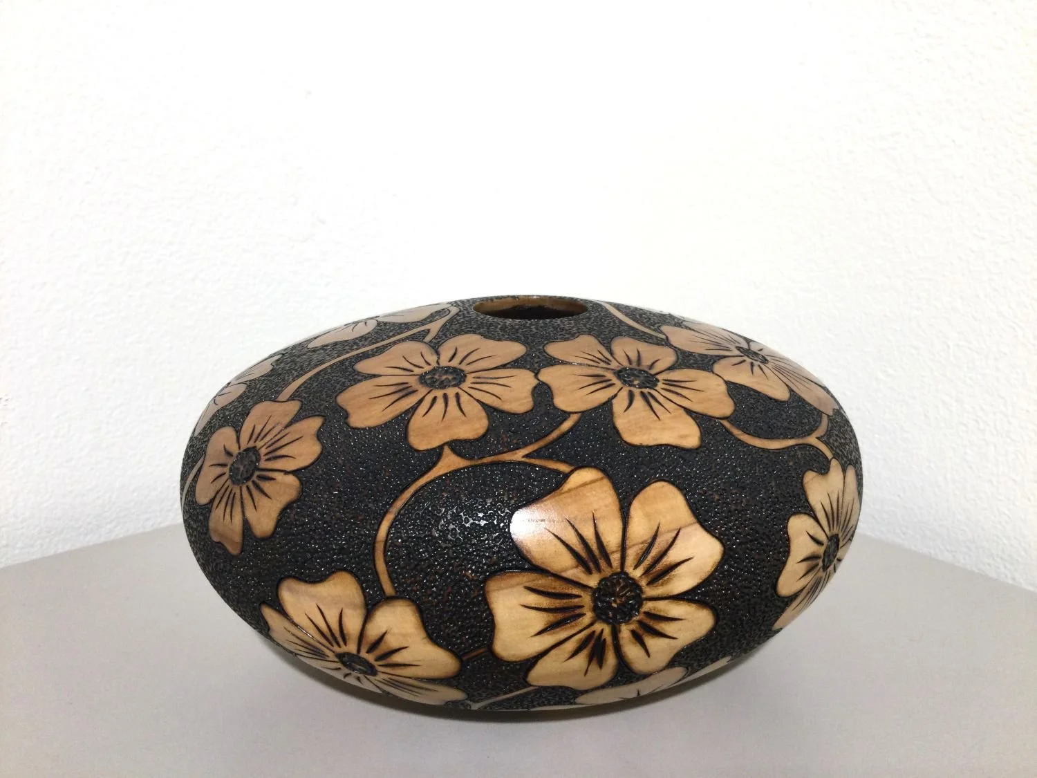 Apple Blossom Vase, turned, ebonized and textured apple wood, 3 x 5.5 inches (8 x 14 cm), sold.