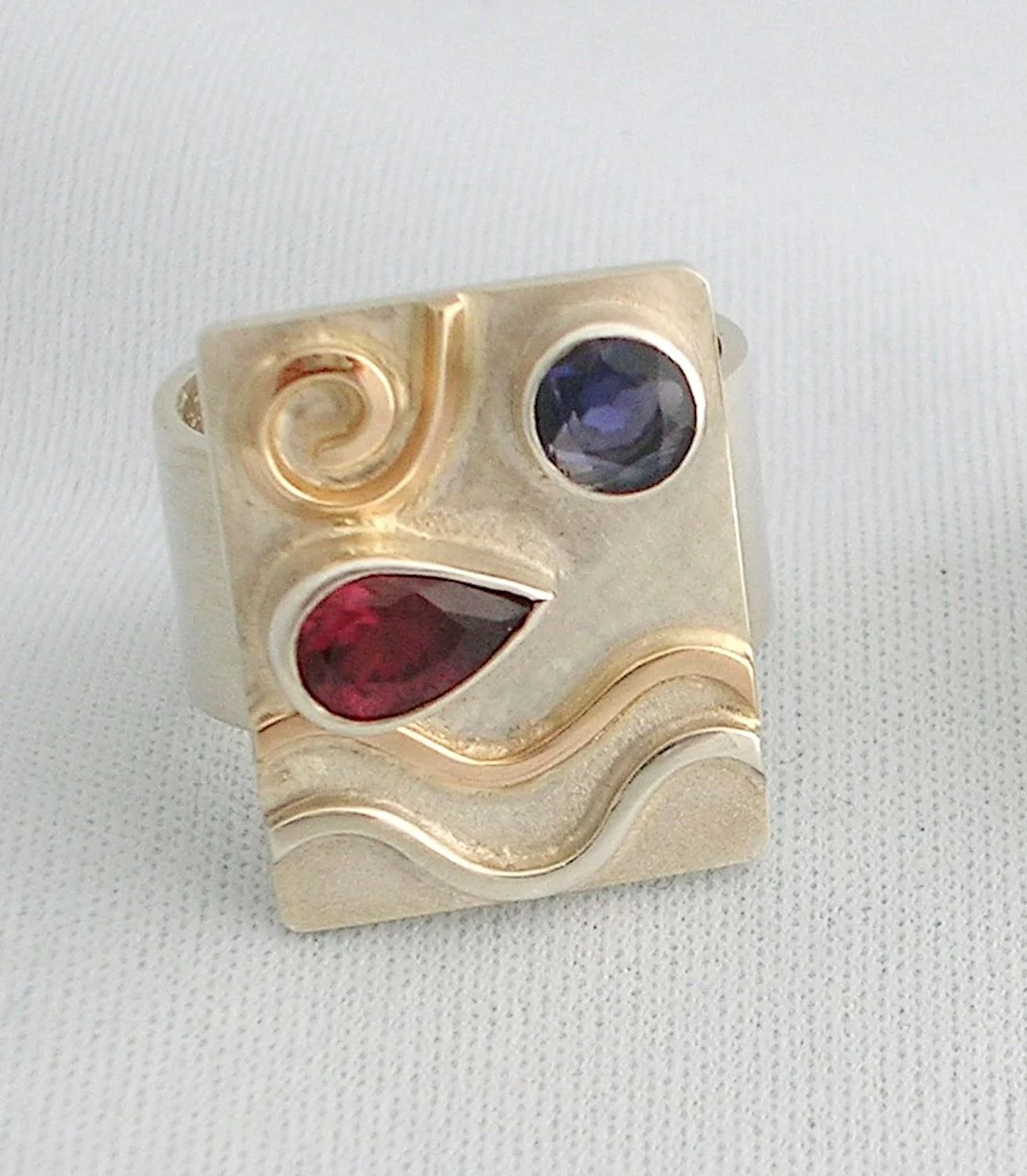Tableaux Ring (R107), 2022, sterling, 14K, iolite, rhodolite garnet, size 7.5, $565.00 Cdn.