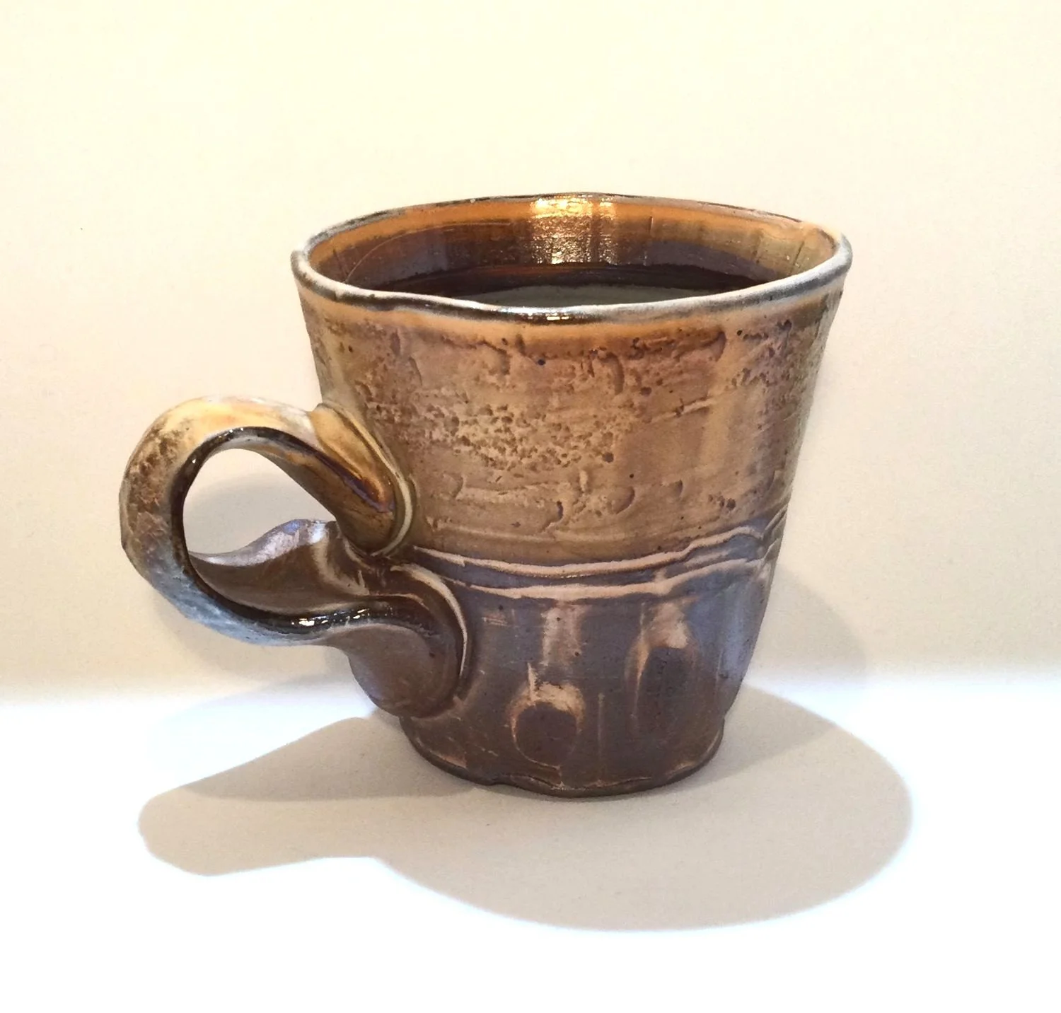 Confluence - Espresso Mug (#26.2.68), 2026, low soda-fired earthenware, 3.25 x 4.25 x 3.25 inches (8.5 x 11 x 8 cm), $60 Cdn.