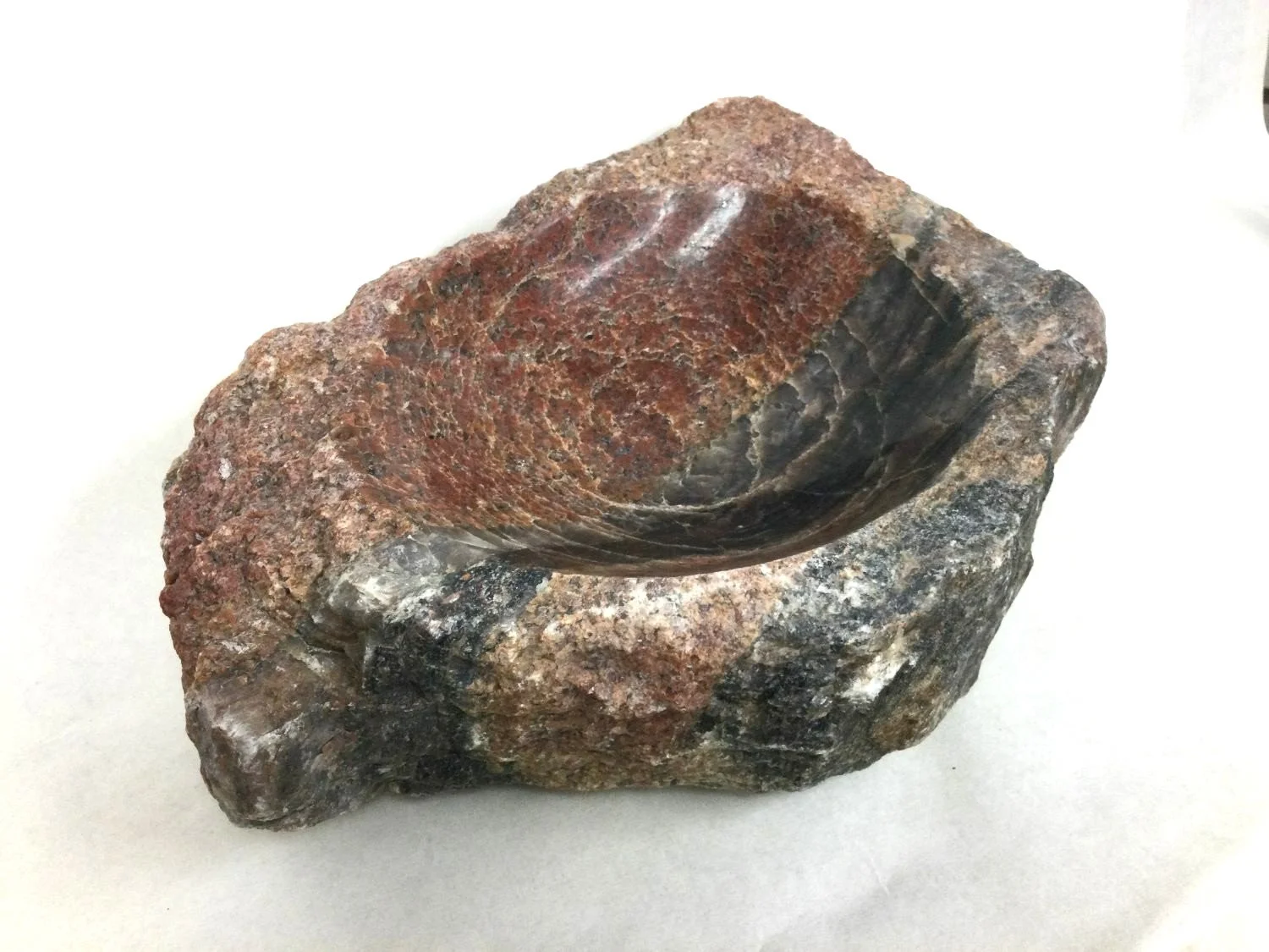 Fieldstone Bowl (#25.36), 2025, found rock, bored, polished, 3 x 12 x 8 inches (7.5 x 30.5 x 20.5 cm) $495 Cdn