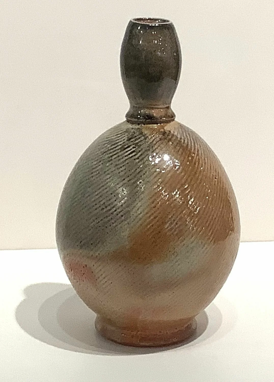 Shino Glazed Bud Vase (#24.11.46), 2024, stoneware, 8 x 4.75 x 4.75 inches (9.4 x 11.1 x 11.1 cm), $80 Cdn.