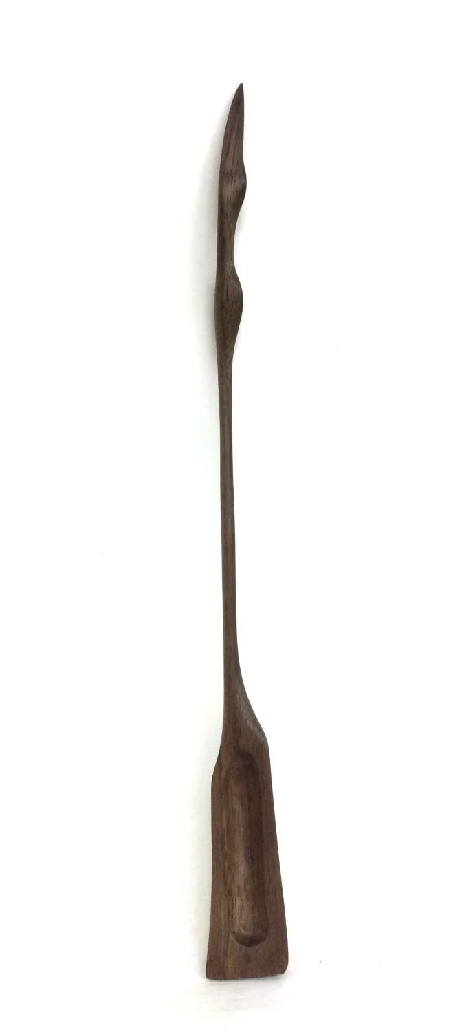 Long Handled Curvy Tasting Spoon (#25.2.14), 2025, chiselled and hand sanded walnut, 11 x 1 .5 inches (23 x 3 x 1.5 cm), sold.