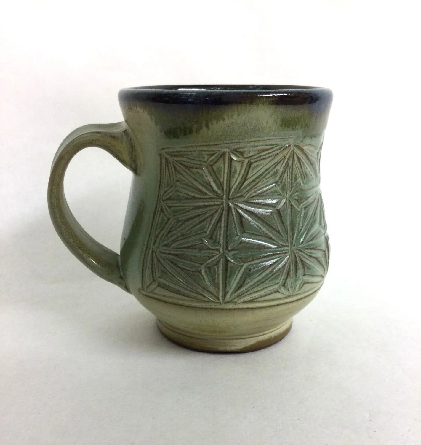 Kumiko Green Fields Mug (#25.9.13), handcarved stoneware, 5 x 3.5 x 5 inches (13 x 9 x 13 cm), $50 Cdn.