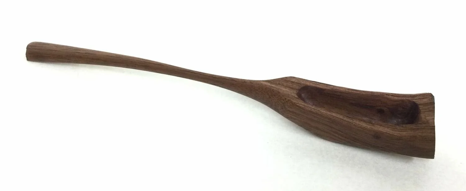 The Rough And The Smooth Spoon (#25.12.21), 2025, chiseled and hand sanded walnut, 7 x .75 x .5 inches (18 x 2 x 1 cm), $49.95 Cdn