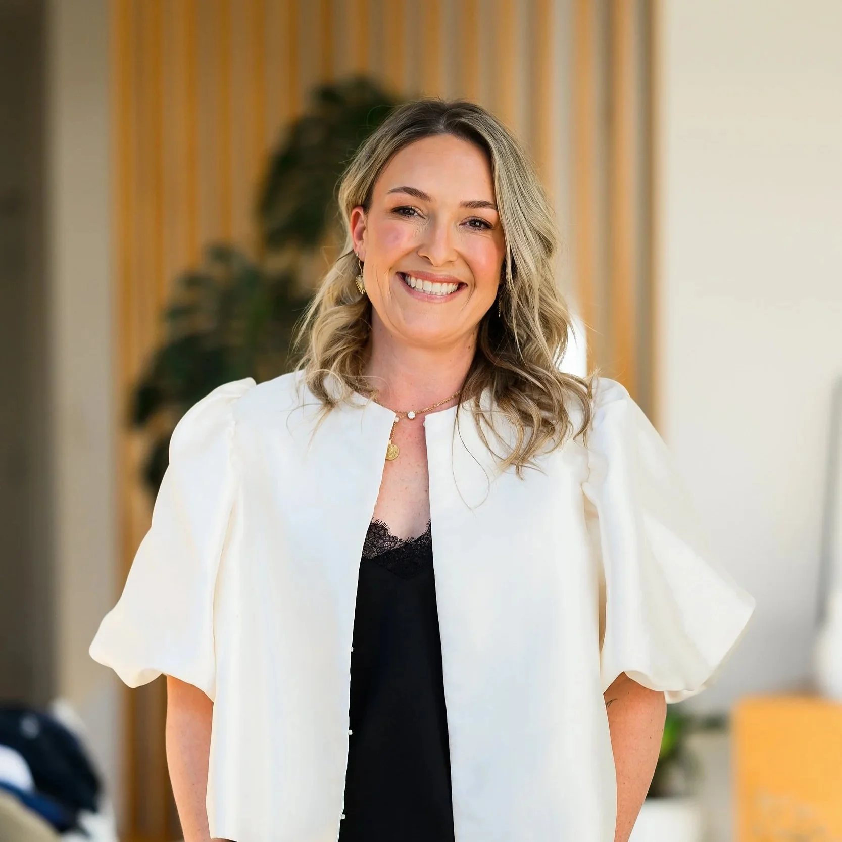 Business woman in white studio for business shoot. 