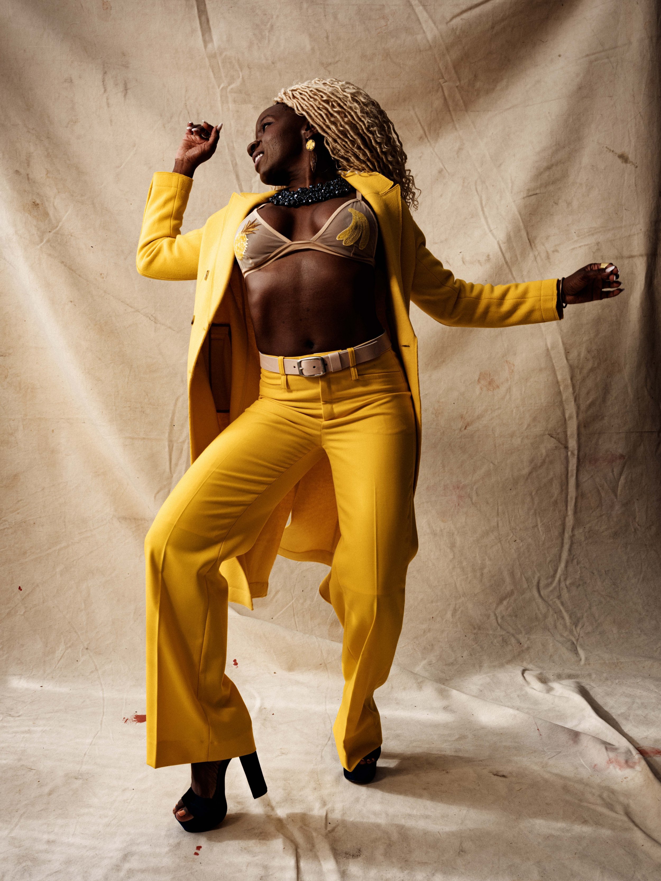 high-fashion-yellow-power-suit-black-model-editorial-style-vogue-energy-marsh-studio-fuji-gfx-profoto.jpg