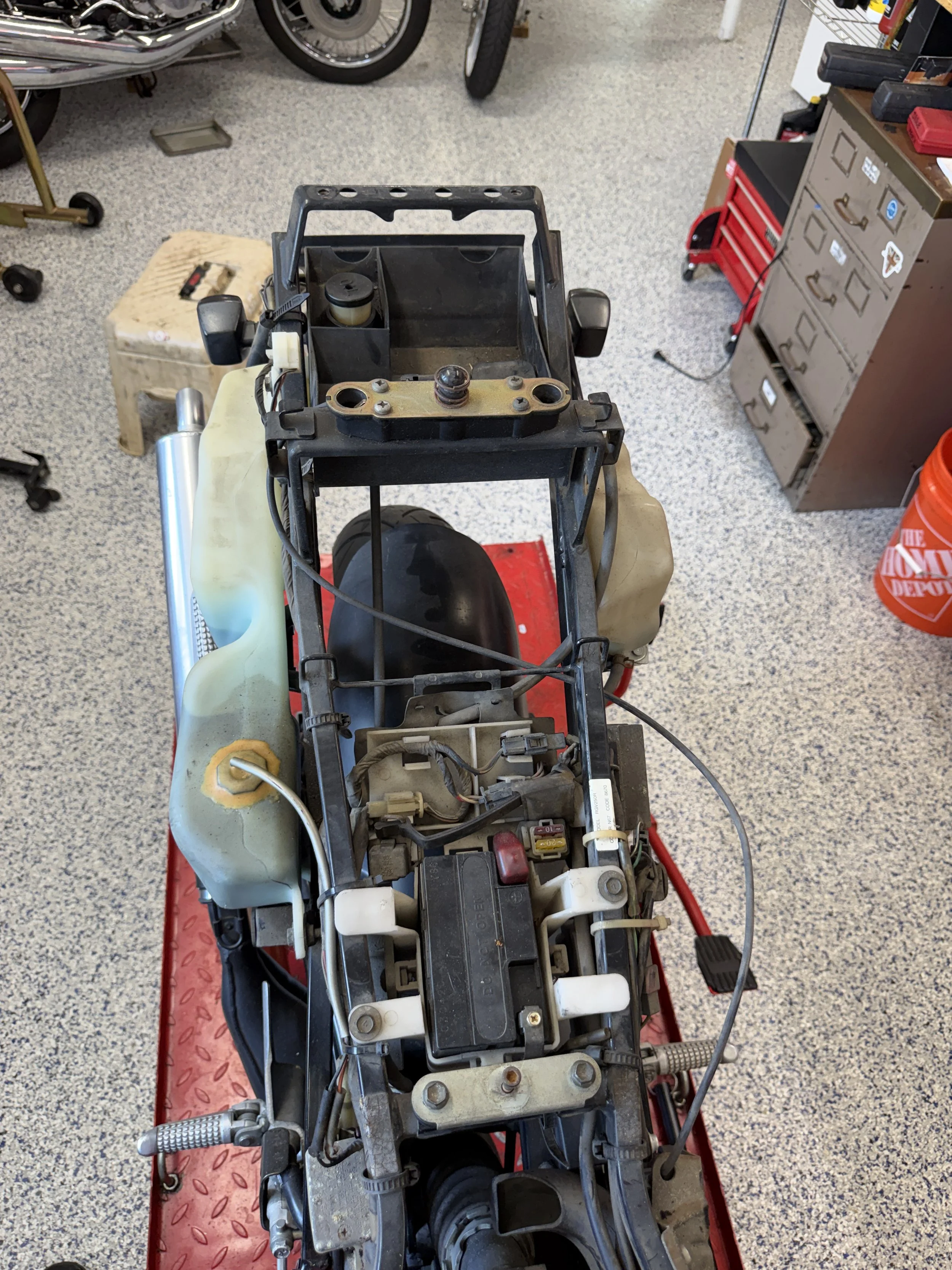 ...and then pull the panels over the oil and coolant reservoirs....