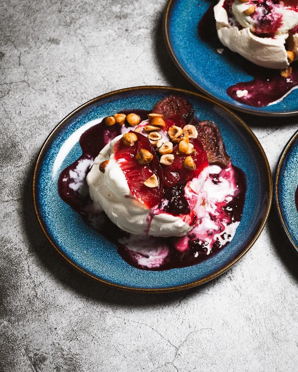 Dreaming of this winter pavlova from our last bistro. Ginger roasted plums,  blackberry compote, sticky wine glazed figs, toasted hazelnuts and vanilla ice cream - a perfect combo