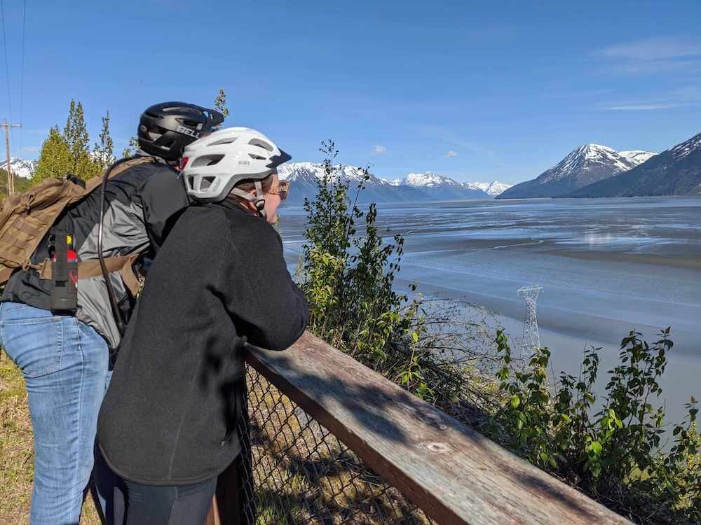 Two bikers looking at Turnagain Arm