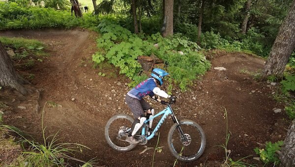  Biker speeding down Alyeska Mountain 