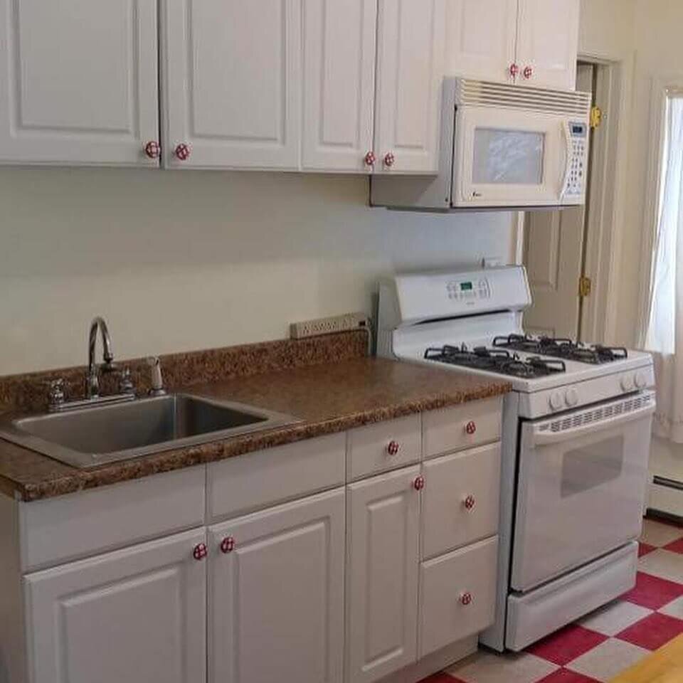  A kitchen area in a room by Bird Creek Motel and RV Park  