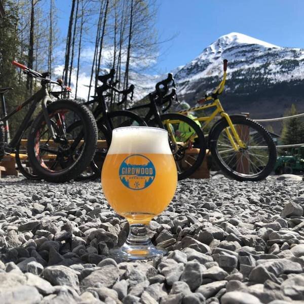  Glass of beer in front of bikes at Girdwood Brewing Company 
