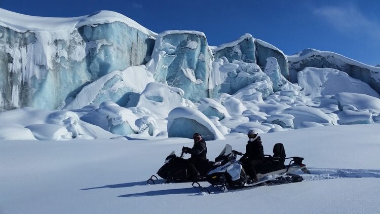  Two Snowmobiles on a tour with Alaska Backcountry Access 