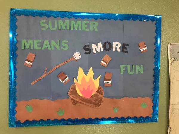  Bulletin board with the words “summer means smore fun“ at Little Bears Playhouse 