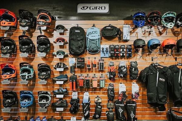  A wall full of ski helmets and other ski gear 