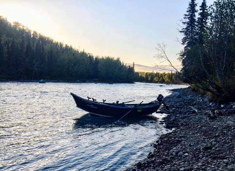  A drift boat in the evening on the river on the Alaska Drift Away Fishing property 