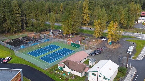  Girdwood Parks and Recreation aerial view of park area with tennis court, skate park and playground 