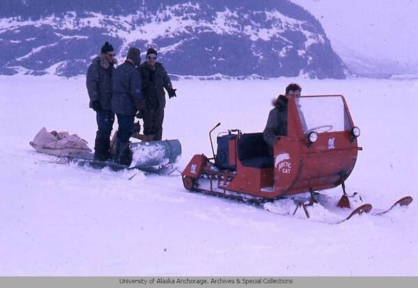  People snowmobiling and skiing in the 1960s 