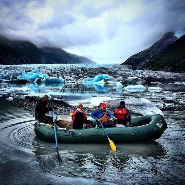  Raft next to an iceberg with Chugach Adventure Guides 