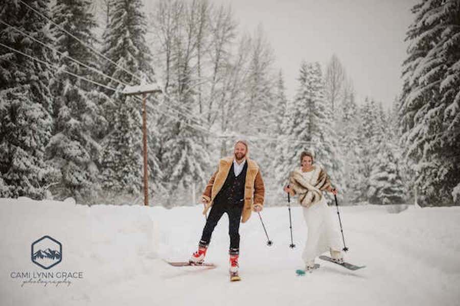  A couple skiing in wedding attire photographed by Cami Lynn Grace Photography 