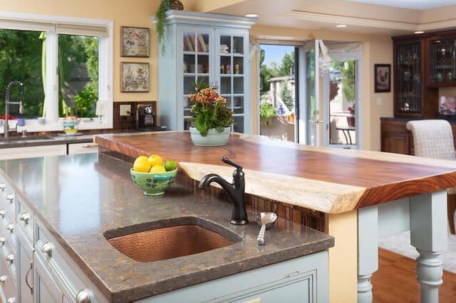  A kitchen with Corian counters by Mountain Top Countertops 
