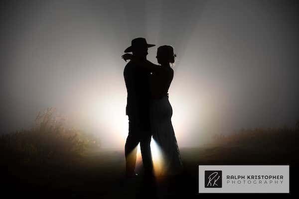  A man and woman kissing  photo by Ralph Krisopher Photography 