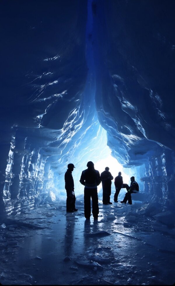  People in an Ice cave on a tour with Alaska Wild Guides 