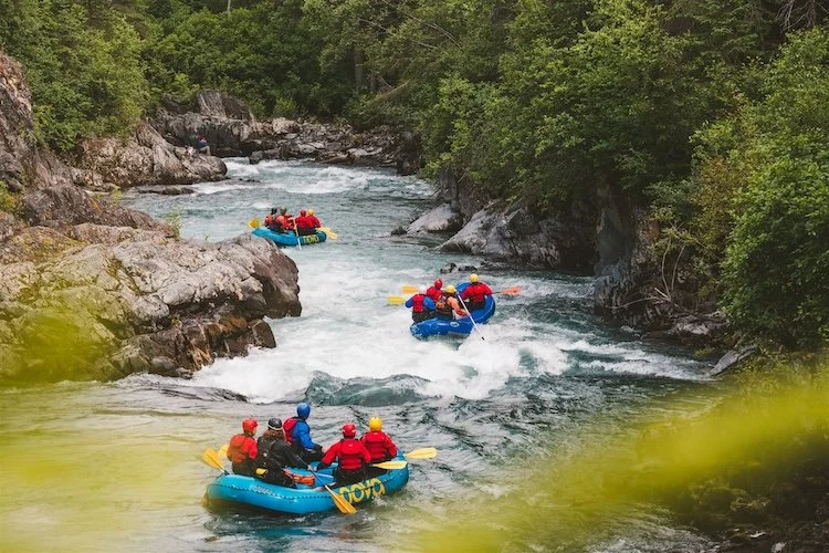  Three Rafts with NOVA Alaska Guides floating the river  