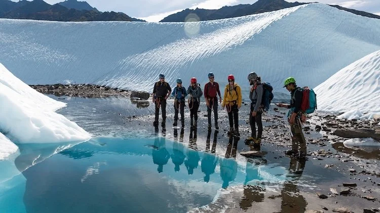  People looking at Glacier pool on tour with  NOVA Alaska Guides  