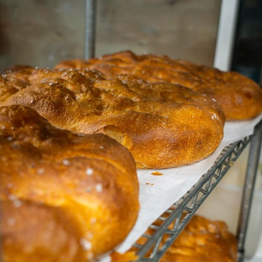 Fresh from the oven rosemary focaccia, kissed with Cornish sea salt and baked to a golden glow. 🌿🌊 - simple, rustic, and impossible to resist.

Tear, share, and savour a taste of Cornwall 

#gyllybeachcafe #foccacia #bakery #Cornish
