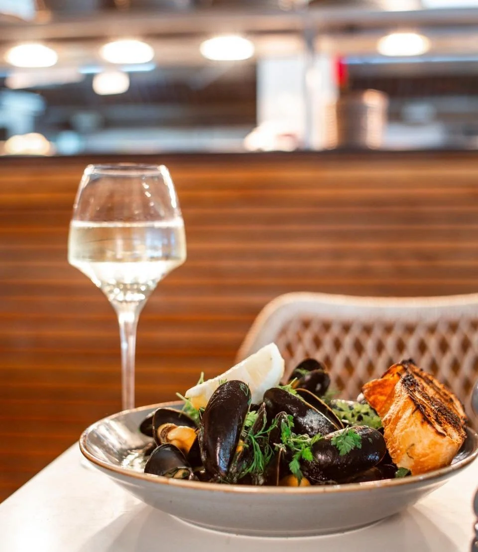 A dish you can&rsquo;t miss when by the sea 🌊🦪

The St Austell Bay Mussels-white wine and garlic cream, salted fries, and fresh toasted focaccia to soak up every last bit 🤎✨

Does anything pair better with a crisp glass of Albari&ntilde;o and a se