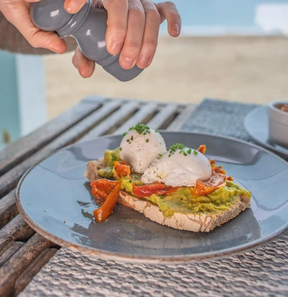 Breakfast done right 🍳🥑
Smashed avocado, slow-poached eggs, roasted tomatoes, and crunchy sourdough &mdash; made fresh and served with a side of ocean views. 🌊✨

Join us for breakfast any day of the week 9-11:30am 🍴

#falmouth #gyllybeach #Breakf