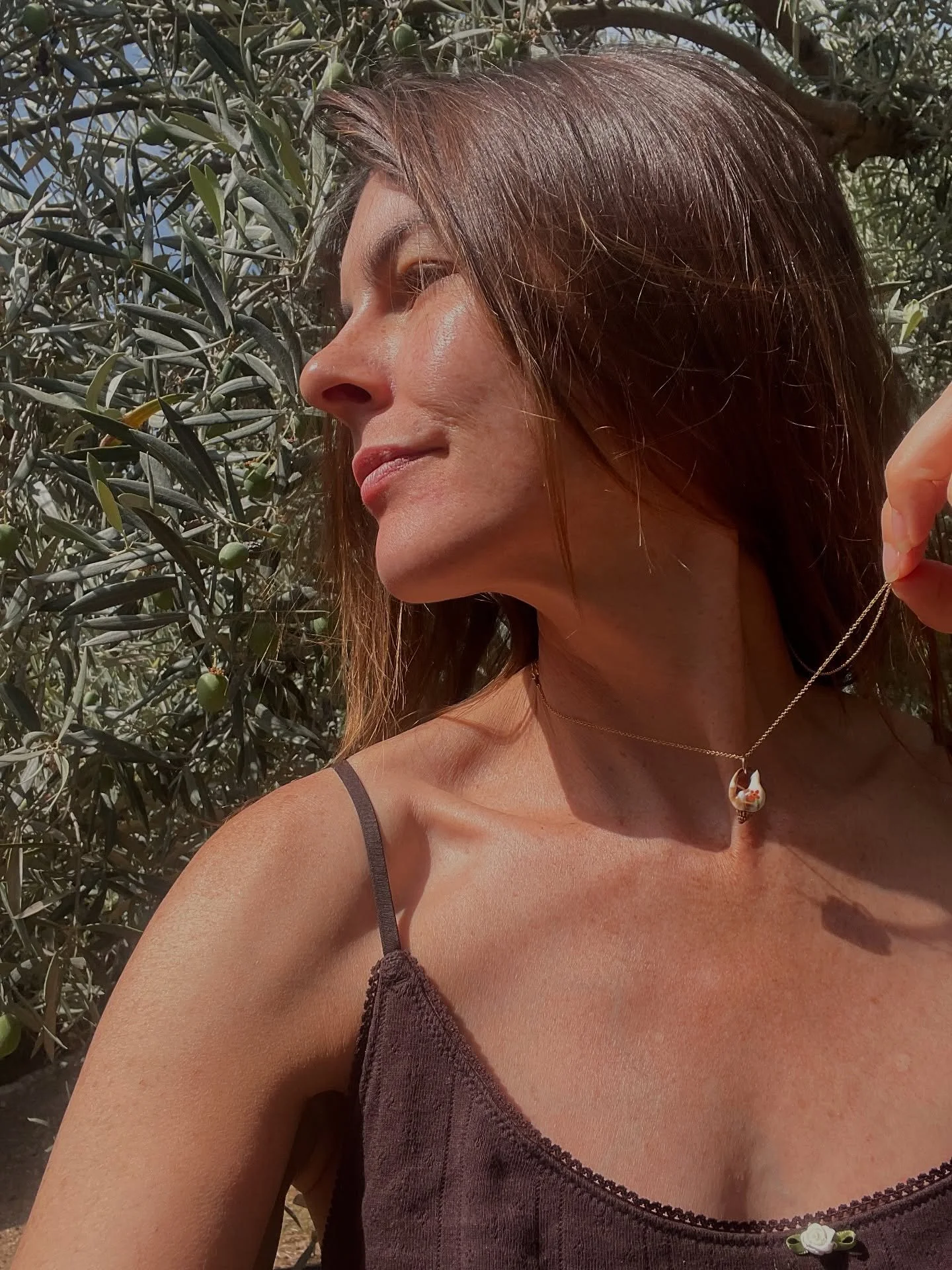 Sunday morning in my own little olive grove 🕊️ Summer of Love folk flower necklace looking right at home in the Andaluc&iacute;an sunshine🌞