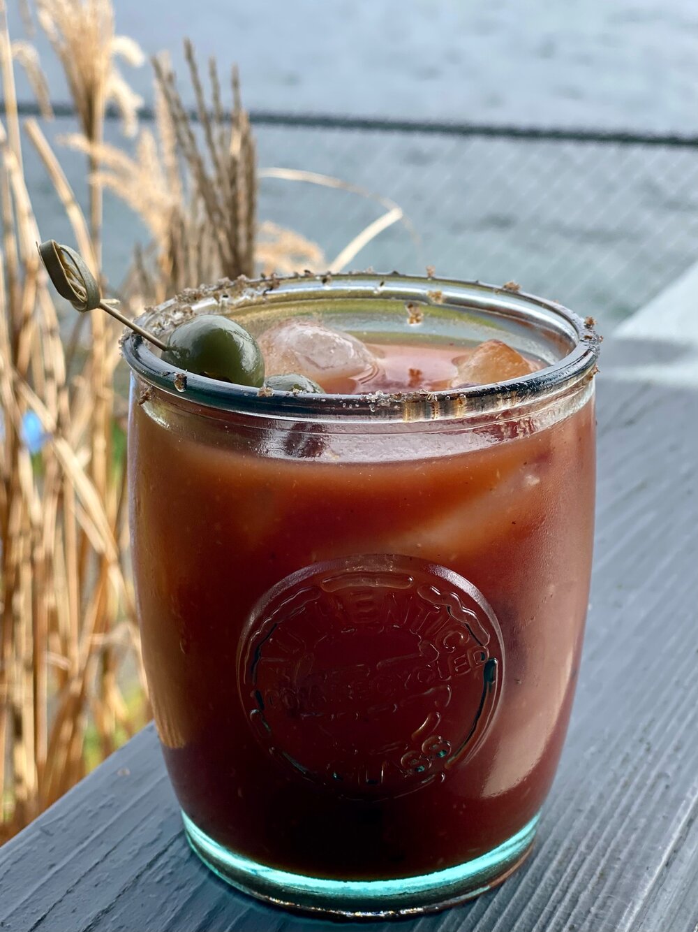 House made Bloody Mary cocktail mixture from vegetables in pitcher