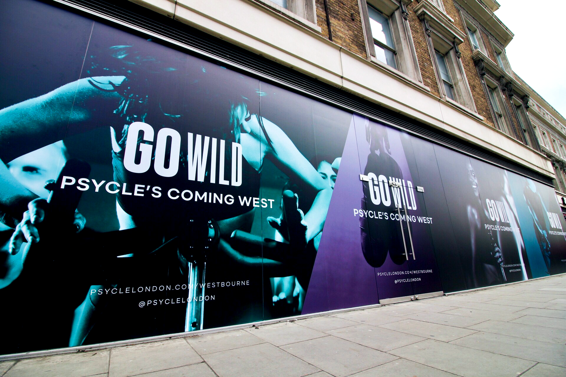 Promotional hoarding for Psycle's new studio in Notting Hill