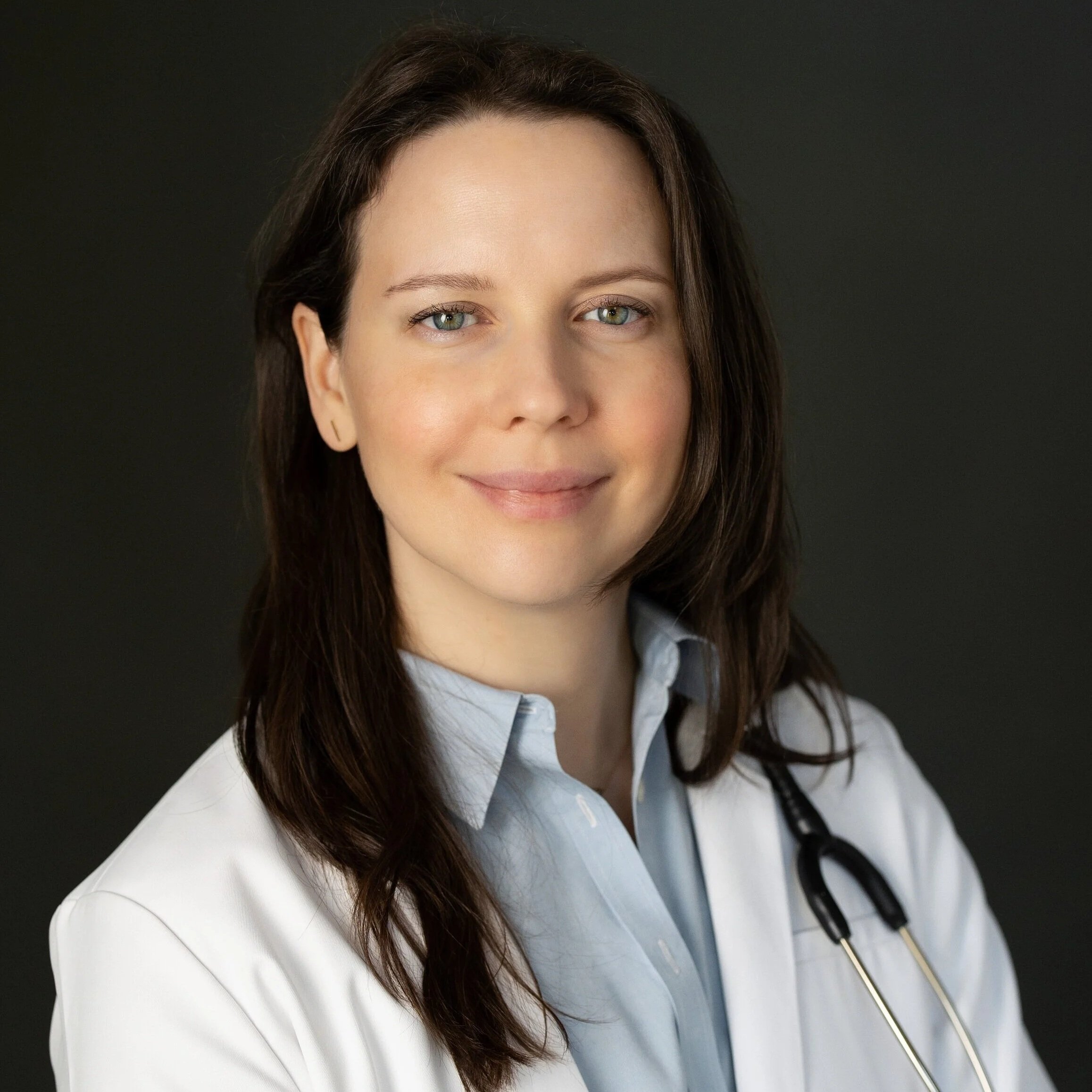 Nurse Practitioner Julia Standefer, advanced practice registered nurse, stethoscope, white coat, clinic, heathcare, functional medicine, family practice